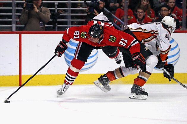 CHICAGO, IL - FEBRUARY 13:  Marian Hossa #81 of the Chicago Blackhawks suffering an injury after this collison with Hampus Lindholm #47 of the Anaheim Ducks in the second period at the United Center on February 13, 2016 in Chicago, Illinois.  (Photo by Jonathan Daniel/Getty Images)