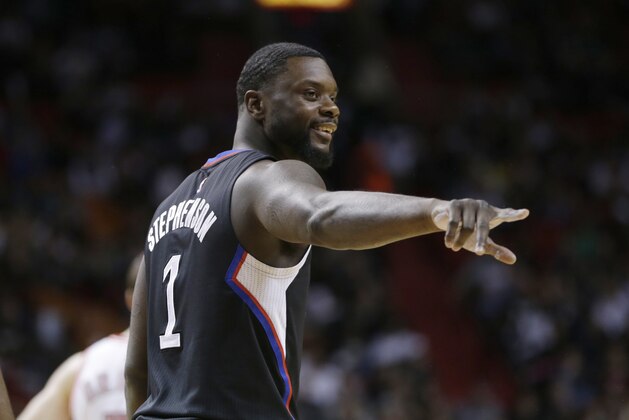 Los Angeles Clippers guard Chris Paul acknowledges a fan during the first half of an NBA basketball game against the Miami Heat, Sunday, Feb. 7, 2016, in Miami. (AP Photo/Lynne Sladky)