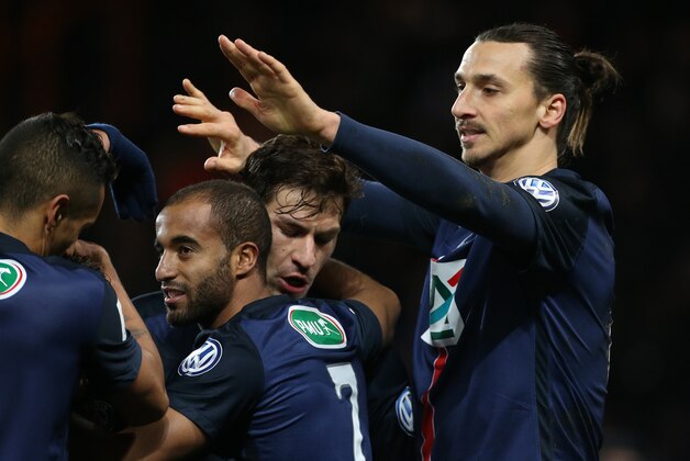 PARIS - FEBRUARY 10: Zlatan Ibrahimovic of PSG celebrates with teammates scoring the third goal during the French Cup (Coupe de France) match between Paris Saint-Germain (PSG) and Olympique Lyonnais (OL) at Parc des Princes stadium on February 10, 2016 in Marseille, France. (Photo by Jean Catuffe/Getty Images)
