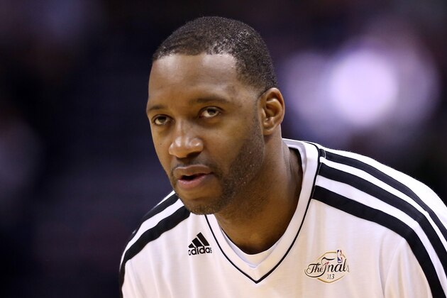 SAN ANTONIO, TX - JUNE 13:  Tracy McGrady #1 of the San Antonio Spurs warms-up before taking on the Miami Heat in Game Four of the 2013 NBA Finals at the AT&T Center on June 13, 2013 in San Antonio, Texas. NOTE TO USER: User expressly acknowledges and agrees that, by downloading and or using this photograph, User is consenting to the terms and conditions of the Getty Images License Agreement.  (Photo by Christian Petersen/Getty Images)