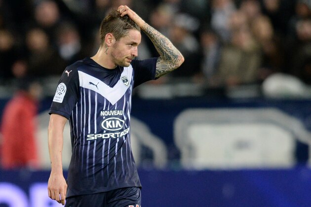 Bordeaux's French defender Mathieu Debuchy reacts during theFrench Ligue 1 football match between Bordeaux and Saint-Etienne at  Matmut Atlantique Stadium in Bordeaux, southwestern France, on February 7, 2016 . AFP PHOTO / NICOLAS TUCAT / AFP / NICOLAS TUCAT        (Photo credit should read NICOLAS TUCAT/AFP/Getty Images)