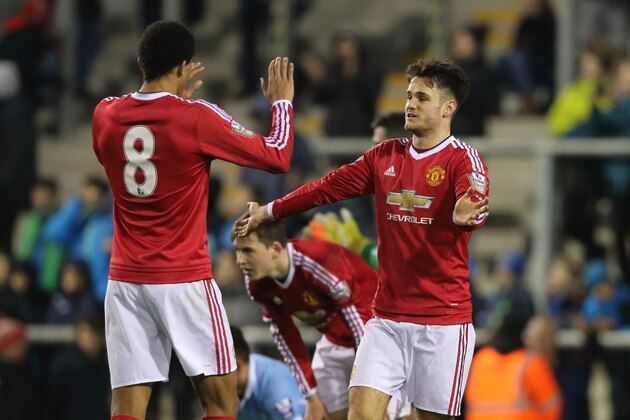 LEIGH, ENGLAND - FEBRUARY 11:  Devonte Redmond and Joe Riley of Manchester United U21 celebrate the 1-0 victory after the Barclays Under-21 Premier League Division One match between Manchester United U21 and Manchester City U21 at  Leigh Sports Village Stadium on February 11, 2016 in Leigh, England.  (Photo by Matthew Ashton - AMA / via Getty Images)