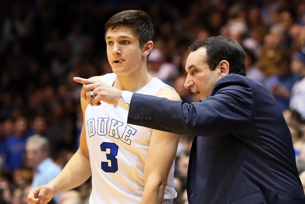 Feb 8, 2016; Durham, NC, USA; Duke Blue Devils head coach Mike Krzyzewski (R) talks to guard Grayson Allen (3) in the second half against the Louisville Cardinals at Cameron Indoor Stadium. Mandatory Credit: Mark Dolejs-USA TODAY Sports