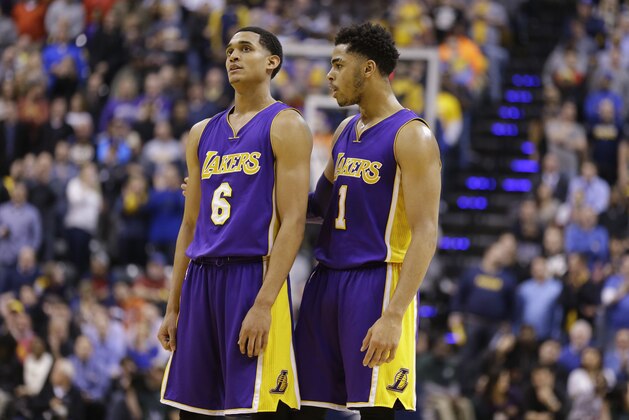 Los Angeles Lakers guard D'Angelo Russell (1) talks with guard Jordan Clarkson (6) during the second half of an NBA basketball game against the Indiana Pacers in Indianapolis, Monday, Feb. 8, 2016. The Pacers defeated the Lakers 89-87. (AP Photo/Michael Conroy)