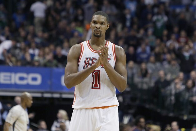 Miami Heat forward Chris Bosh (1) reacts to a call during the second half of an NBA basketball game against the Dallas Mavericks Wednesday, Feb. 3, 2016, in Dallas. (AP Photo/LM Otero)