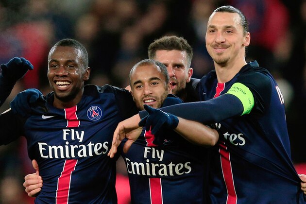 PSG's Lucas, center, celebrates with Zlatan Ibrahimovic, right, and Blaise Matuidi, after scoring during the League One soccer match between Paris Saint Germain and Angers, at the Parc des Prince stadium in Paris, Saturday, Jan. 23, 2016. (AP Photo/Thibault Camus)