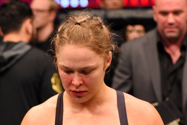 MELBOURNE, AUSTRALIA - NOVEMBER 15:  Ronda Rousey looks on after losing her championship title by KO (head kick and punches) to Holly Holm (not pictured) in two rounds of their UFC women's bantamweight championship bout during the UFC 193 event at Etihad Stadium on November 15, 2015 in Melbourne, Australia.  (Photo by Josh Hedges/Zuffa LLC/Zuffa LLC via Getty Images)