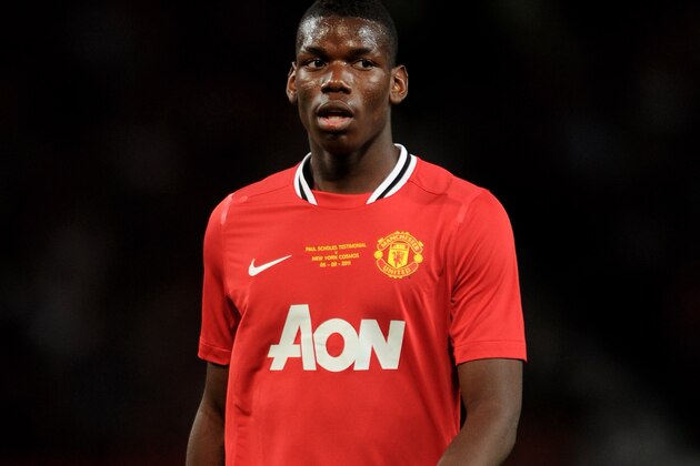 MANCHESTER, ENGLAND - AUGUST 05:  Paul Pogba of Manchester United looks on during Paul Scholes' Testimonial Match between Manchester United and New York Cosmos at Old Trafford on August 5, 2011 in Manchester, England.  (Photo by Chris Brunskill/Getty Images)