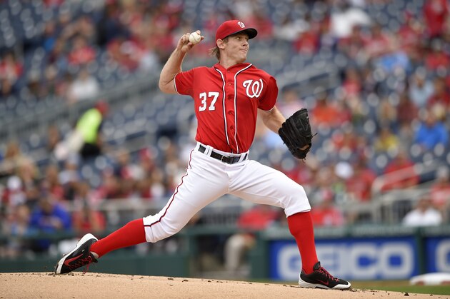 Washington Nationals starting pitcher Stephen Strasburg (37) delivers a pitch against the Philadelphia Phillies during the first inning of a baseball game, Saturday, Sept. 26, 2015, in Washington. (AP Photo/Nick Wass)