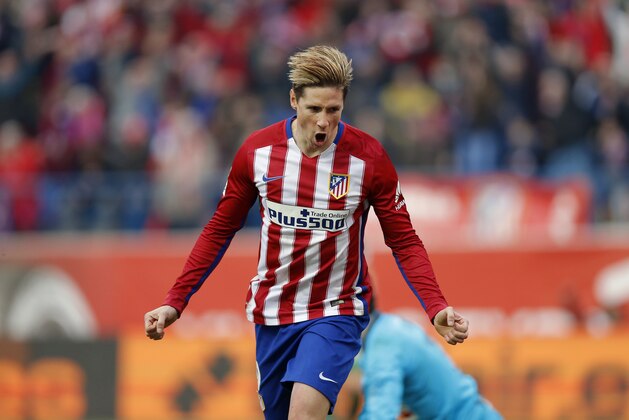Atletico's Fernando Torres celebrates after scoring a goal during a Spanish La Liga soccer match between Atletico de Madrid and Eibar at the Vicente Calderon stadium in Madrid, Spain, Saturday, Feb. 6, 2016. (AP Photo/Daniel Ochoa de Olza)