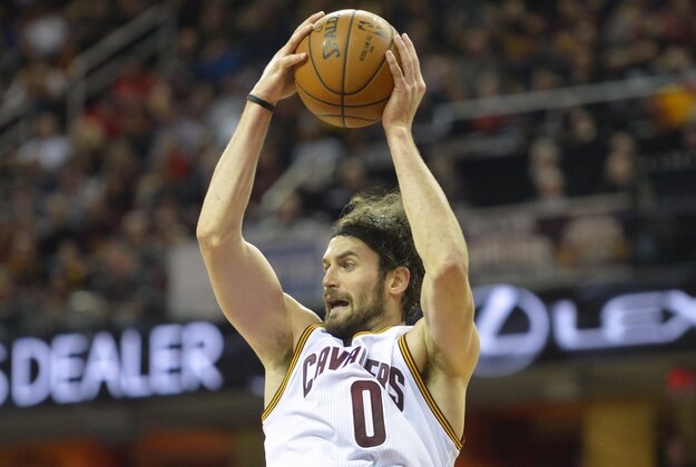 Feb 8, 2016; Cleveland, OH, USA; Cleveland Cavaliers forward Kevin Love (0) rebounds in the first quarter against the Sacramento Kings at Quicken Loans Arena. Mandatory Credit: David Richard-USA TODAY Sports