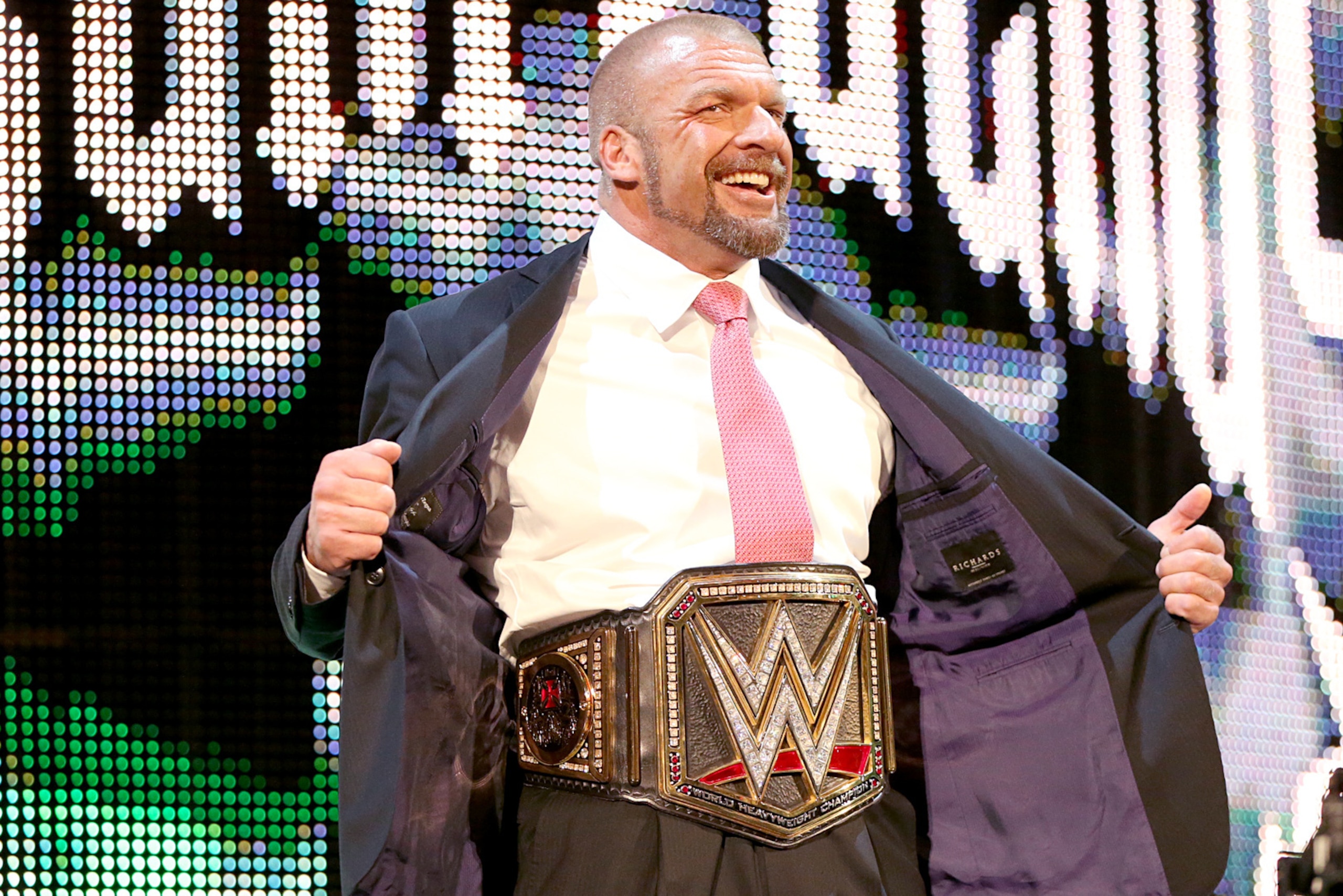 Triple H as the WWE World Heavyweight champion.