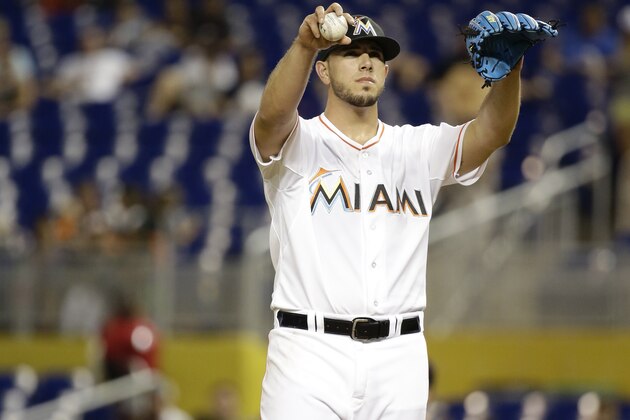 Miami Marlins starting pitcher Jose Fernandez gets set to throw in the first inning of a baseball game against the Atlanta Braves, Friday, Sept. 25, 2015, in Miami. (AP Photo/Lynne Sladky)