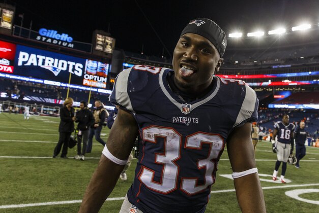 Oct 29, 2015; Foxborough, MA, USA; New England Patriots running back Dion Lewis (33) exits the field after defeating the Miami Dolphins at Gillette Stadium. The Patriots defeated the Miami Dolphins 36-7. Mandatory Credit: David Butler II-USA TODAY Sports