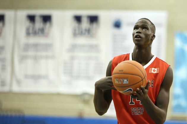 Orangeville Prep's Thon Maker #14 shoots a free throw against Phelps Academy during their Big Apple Basketball Classic high school basketball game in Manhattan, NY on Saturday, January 17,  2015.  (AP Photo/Gregory Payan)