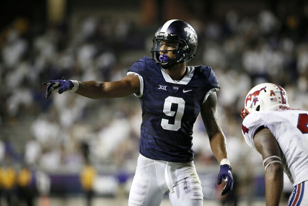 TCU wide receiver Josh Doctson (9) lines up against SMU defensive back David Johnson (4) during an NCAA college football game Saturday, Sept. 19, 2015, in Fort Worth, Texas. (AP Photo/Tony Gutierrez)