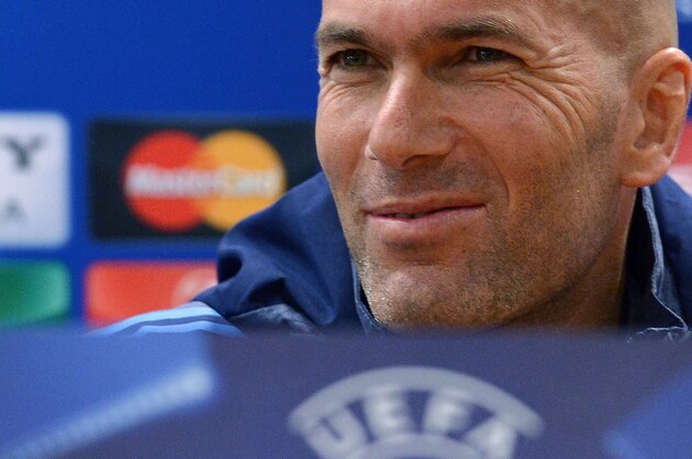 Real Madrid's French head coach Zinedine Zidane looks on during a press conference at the Olympic Stadium in Rome on February 16, 2016, on the eve of their UEFA Champions League round of sixteen first leg football match against AS Roma. / AFP / TIZIANA FABI        (Photo credit should read TIZIANA FABI/AFP/Getty Images)