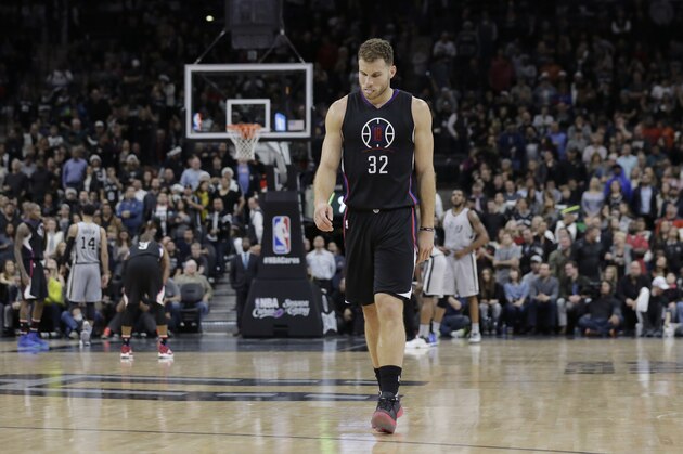 Los Angeles Clippers forward Blake Griffin walks up court during the final seconds of the team's 115-107 loss to San Antonio Spurs in an NBA basketball game, Friday, Dec. 18, 2015, in San Antonio. (AP Photo/Eric Gay)