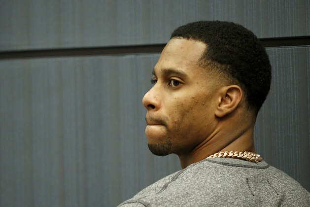New York Giants wide receiver Victor Cruz listens as Giants owner John Mara speaks during a news conference about Tom Coughlin stepping down as head coach of the team, Tuesday, Jan. 5, 2016, in East Rutherford, N.J. (AP Photo/Julio Cortez)