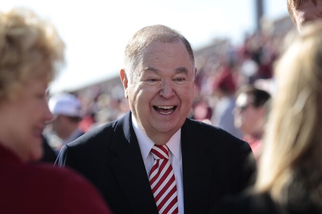 NORMAN, OK - NOVEMBER 16:  President David Boren of the University of Oklahoma greets people on the sidelines before the game against the Iowa State Cyclones November 16, 2013 at Gaylord Family-Oklahoma Memorial Stadium in Norman, Oklahoma. Oklahoma defeated Iowa State 48-10. (Photo by Brett Deering/Getty Images)