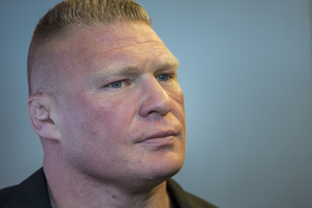Former UFC heavyweight champion Brock Lesnar pauses for a photo after ruling out a return to mixed martial arts, ending three years of speculation about the biggest pay-per-view star in the sport's history, as he announced he had re-signed with WWE in an interview on ESPN's