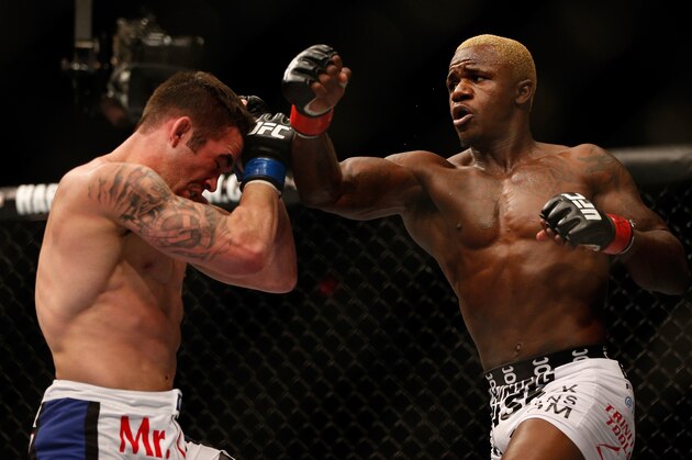 LAS VEGAS, NV - DECEMBER 29:  (R-L) Melvin Guillard punches Jamie Varner during their lightweight fight at UFC 155 on December 29, 2012 at MGM Grand Garden Arena in Las Vegas, Nevada. (Photo by Josh Hedges/Zuffa LLC/Zuffa LLC via Getty Images)