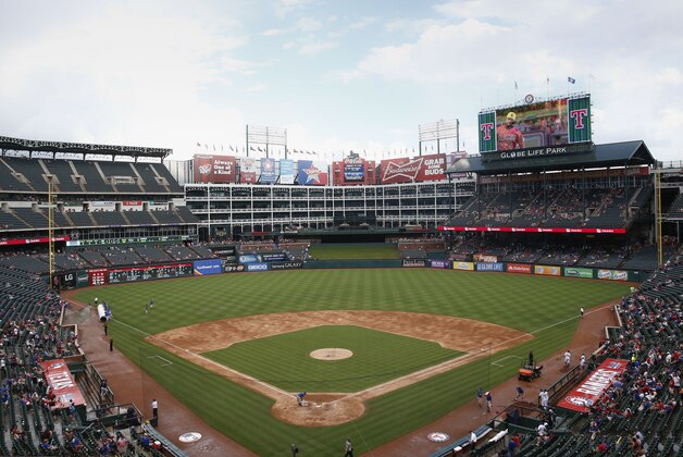 A view of Globe Life Park during the seventh inning rain delay during a baseball game between the Minnesota Twins and the Texas Rangers, Saturday, June 13, 2015, in Arlington, Texas. (AP Photo/Jim Cowsert)