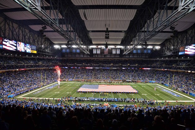 Dec 3, 2015; Detroit, MI, USA; General view of the playing of the national anthem with a United States flag at Ford Field before an NFL football game between the Green Bay Packers and the Detroit Lions. Mandatory Credit: Kirby Lee-USA TODAY Sports