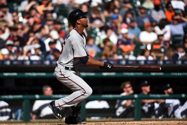 Sep 27, 2015; Detroit, MI, USA; Minnesota Twins center fielder Byron Buxton (25) hits a home run during the eighth inning against the Detroit Tigers at Comerica Park. Mandatory Credit: Tim Fuller-USA TODAY Sports