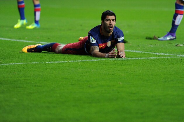 GIJON, SPAIN - FEBRUARY 17:  Luis Suarez of FC Barcelona reacts during the La Liga match between Sporting Gijon and FC Barcelona at Estadio El Molinon on February 17, 2016 in Gijon, Spain.  (Photo by Denis Doyle/Getty Images)