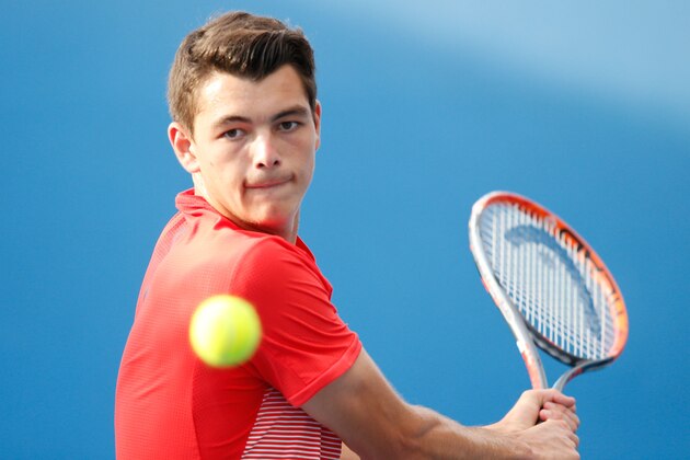 MELBOURNE, AUSTRALIA - JANUARY 19:  Taylor Fritz of the United States plays a backhand in his first round match against Jack Sock of the United States during day two of the 2016 Australian Open at Melbourne Park on January 19, 2016 in Melbourne, Australia.  (Photo by Darrian Traynor/Getty Images)