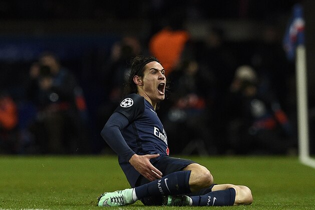 Paris Saint-Germain's Uruguayan forward Edinson Cavani celebrates after scoring a goal during the Champions League round of 16 first leg football match between Paris Saint-Germain (PSG) and Chelsea FC on February 16, 2016, at the Parc des Princes stadium in Paris. PSG won 2-1.   / AFP / FRANCK FIFE        (Photo credit should read FRANCK FIFE/AFP/Getty Images)