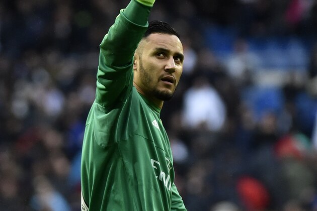 Real Madrid's Costa Rican goalkeeper Keylor Navas waves to his fans after the Spanish league football match Real Madrid CF vs Athletic Club Bilbao at the Santiago Bernabeu stadium in Madrid on February 13, 2016. Real Madrid won 4-2. / AFP / GERARD JULIEN        (Photo credit should read GERARD JULIEN/AFP/Getty Images)