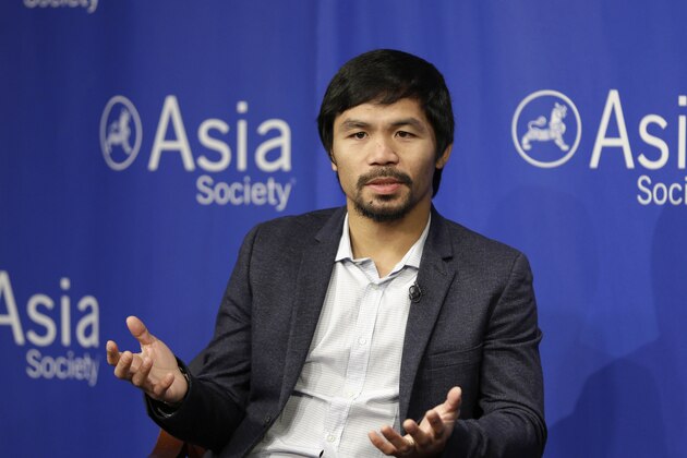 FILE - In this Oct. 12, 2015, file photo, Manny Pacquiao takes questions at the Asia Society in New York. Boxing star Pacquiao has created a firestorm in his home country after saying people in same-sex relationships “are worse than animals.” Pacquiao, who is running for a Philippine Senate seat, made the remark in a video posted Monday, Feb. 15, 2016, on local TV5’s election site. He also said animals are better than people in same-sex relationships because they recognize the difference between males and females. (AP Photo/Seth Wenig, File)