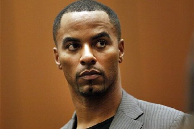 FILE - In this Feb. 20, 2014, file photo, former NFL safety Darren Sharper appears in Los Angeles Superior Court in Los Angeles. Sharper is moving closer to resolving charges that he drugged and sexually assaulted women in four states. Sharper faces at least nine years in prison after having pleaded guilty or no-contest to charges that he distributed drugs with the intent to commit rape in Nevada, Arizona and California. He previously pleaded not guilty in New Orleans, but is set to change that plea Friday morning, May 29, 2015, in federal court. (Bob Chamberlin/Los Angeles Times via AP, Pool, File)