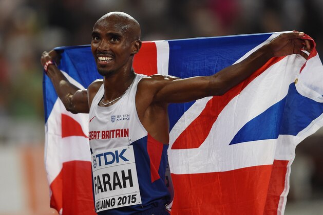 Britain's Mo Farah celebrates winning the final of the men's 5000 metres athletics event at the 2015 IAAF World Championships at the 'Bird's Nest' National Stadium in Beijing on August 29, 2015. AFP PHOTO / JOHANNES EISELE (Photo credit should read JOHANNES EISELE/AFP/Getty Images) Britain's Mo Farah celebrates winning the final of the men's 5000 metres athletics event at the 2015 IAAF World Championships at the 'Bird's Nest' National Stadium in Beijing on August 29, 2015. AFP PHOTO / JOHANNES EISELE (Photo credit should read JOHANNES EISELE/AFP/Getty Images)