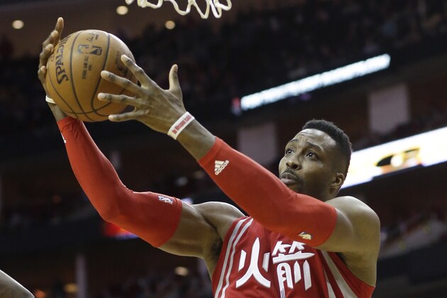 Houston Rockets' Dwight Howard goes to the basket against the Portland Trail Blazers in the second half of an NBA basketball game Saturday, Feb. 6, 2016, in Houston. Portland won 96-79. (AP Photo/Pat Sullivan)