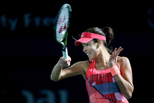 Ana Ivanovic from Serbia returns the ball to Simona Halep from Romania during the third day of the Dubai Tennis Championships in Dubai, United Arab Emirates, Wednesday, Feb. 17, 2016. (AP Photo/Kamran Jebreili)