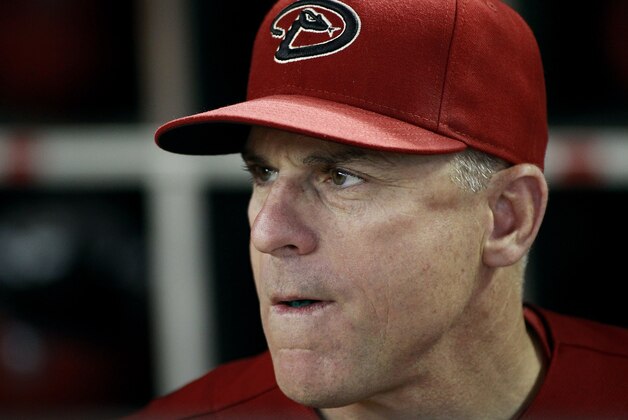 Arizona Diamondbacks manager Chip Hale looks on from the dugout during the start of a baseball game against the Houston Astros, Sunday, Oct. 4, 2015, in Phoenix. The Diamondbacks defeated the Astros 5-3. (AP Photo/Ralph Freso)