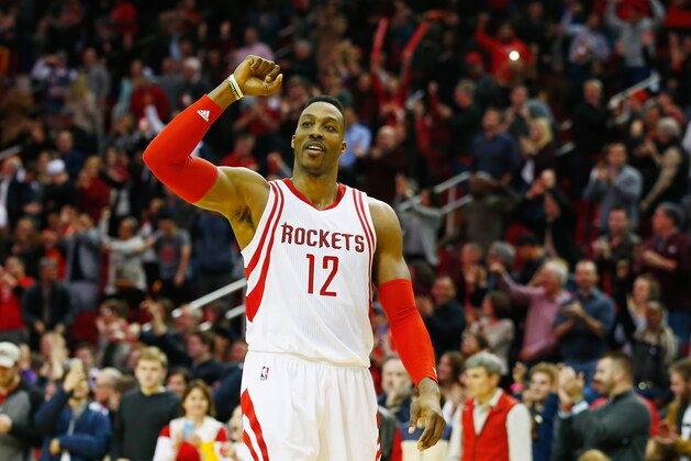 HOUSTON, TX - JANUARY 10:  Dwight Howard #12 of the Houston Rockets celebrates after the Rockets defeated the Indiana Pacers 107-103 in overtime during their game at the Toyota Center on January 10, 2016  in Houston, Texas. NOTE TO USER: User expressly acknowledges and agrees that, by downloading and or using this Photograph, user is consenting to the terms and conditions of the Getty Images License Agreement.  (Photo by Scott Halleran/Getty Images)