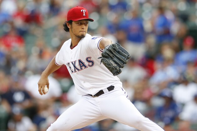 Jul 28, 2014; Arlington, TX, USA; Texas Rangers starting pitcher Yu Darvish (11) throws during the first inning against the New York Yankees at Globe Life Park in Arlington. Mandatory Credit: Kevin Jairaj-USA TODAY Sports