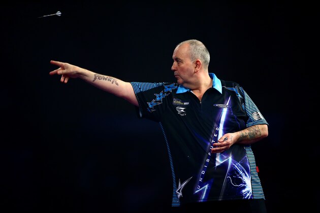 LONDON, ENGLAND - DECEMBER 30:  Phil Taylor of England in action in his third round match against Jelle Klaasen of the Netherlands on Day Twelve of the 2016 William Hill PDC World Darts Championships at Alexandra Palace on December 30, 2015 in London, England.  (Photo by Jordan Mansfield/Getty Images)