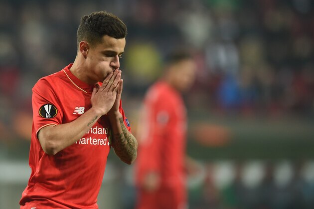 Liverpool's Brazilian midfielder Coutinho reacts during the UEFA Europa League Round of 32 football match between FC Augsburg and Liverpool FC in Augsburg, southern Germany on February 18, 2016. 

 / AFP / Christof STACHE        (Photo credit should read CHRISTOF STACHE/AFP/Getty Images)