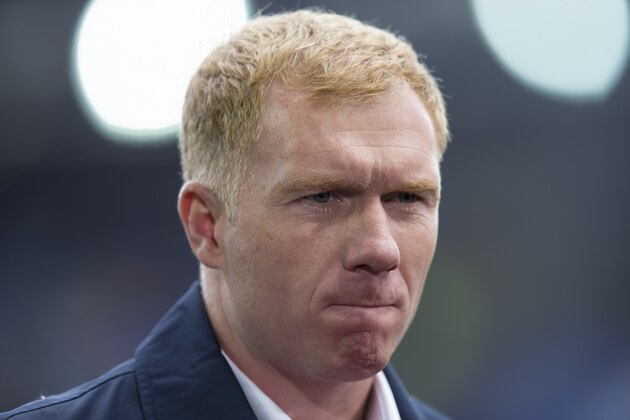 Paul Scholes as a television pundit before the English Premier League soccer match between Everton and Chelsea at Goodison Park Stadium, Liverpool, England, Saturday Sept. 12, 2015. (AP Photo/Jon Super)