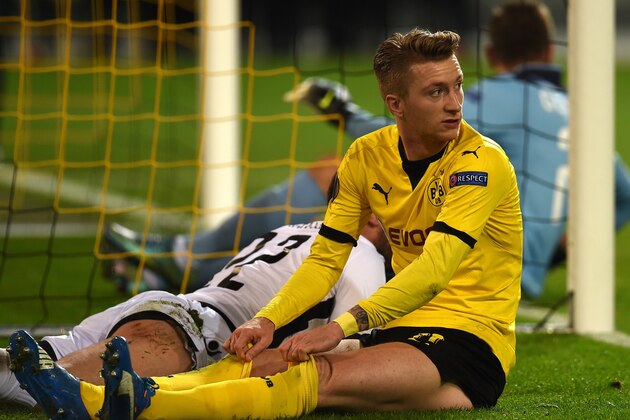 Dortmund's striker Marco Reus reacts during the UEFA Europa League football match between Borussia Dortmund and PAOK FC at BVB Stadion Dortmund in Dortmund on December 10, 2015.  AFP PHOTO / PATRIK STOLLARZ / AFP / PATRIK STOLLARZ        (Photo credit should read PATRIK STOLLARZ/AFP/Getty Images)