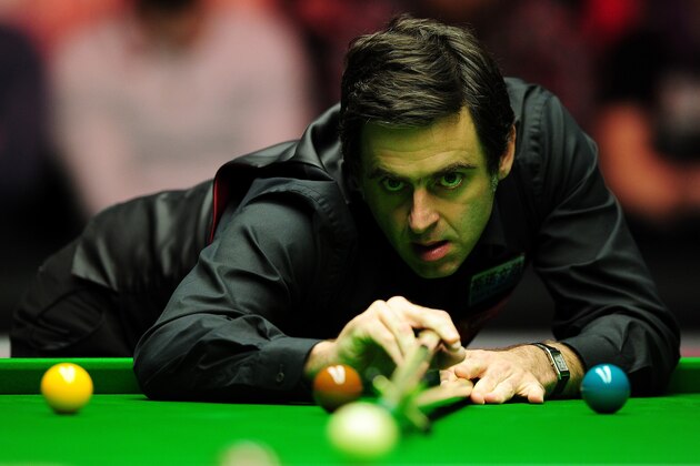 LONDON, ENGLAND - JANUARY 12:  Ronnie O'Sullivan of England plays a shot during his round one match against Mark Williams of Wales on Day Three of The Dafabet Masters at Alexandra Palace on January 12, 2016 in London, England.  (Photo by Dan Mullan/Getty Images)