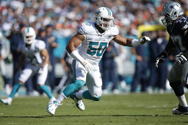 MIAMI GARDENS, FL - NOVEMBER 22: Olivier Vernon #50 of the Miami Dolphins in action against the Dallas Cowboys during the game at Sun Life Stadium on November 22, 2015 in Miami Gardens, Florida. Dallas defeated Miami 24-14. (Photo by Joe Robbins/Getty Images)