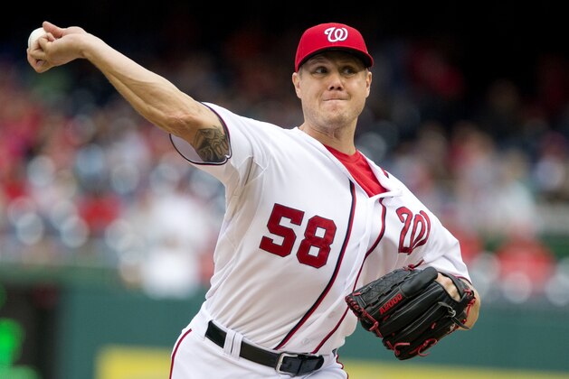 FILE - In this Sept. 27, 2015 file photo, Washington Nationals relief pitcher Jonathan Papelbon pitches in the eighth inning of a baseball game against the Philadelphia Phillies at Nationals Park in Washington. Before the season began, no one was shy about predicting big things for the Washington Nationals. Not even the Nationals themselves, from Bryce Harper's