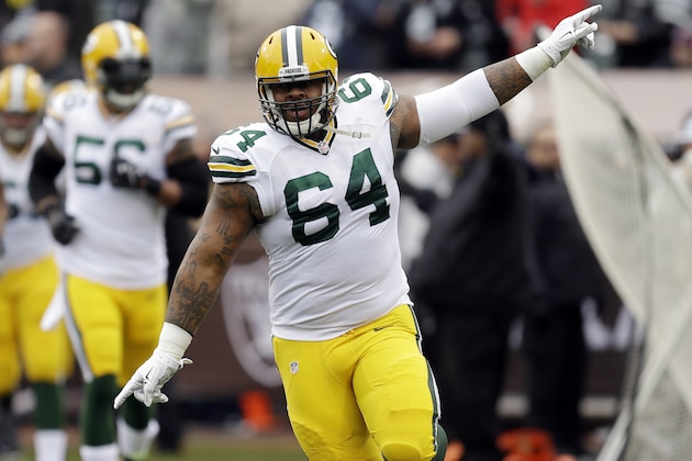 Green Bay Packers defensive end Mike Pennel (64) is introduced before an NFL football game against the Oakland Raiders Sunday, Dec. 20, 2015, in Oakland, Calif. (AP Photo/Ben Margot)