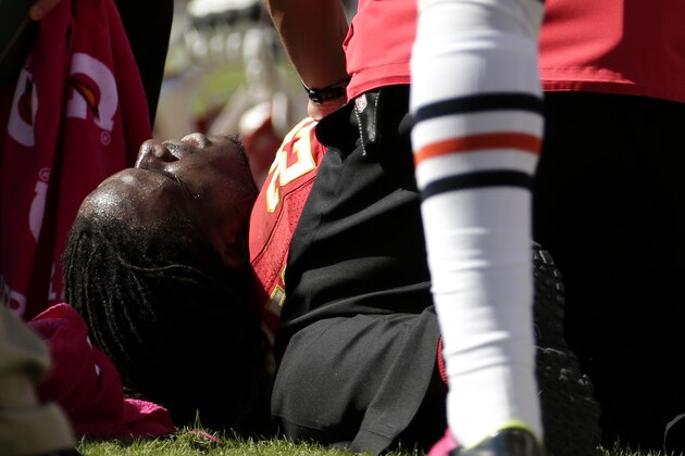 Kansas City Chiefs running back Jamaal Charles (25) lies injured on the field during the second half of an NFL football game against the Chicago Bears in Kansas City, Mo., Sunday, Oct. 11, 2015. (AP Photo/Charlie Riedel)